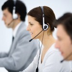 Call Center, Focus On Woman Wearing Headset, Smiling, Side View